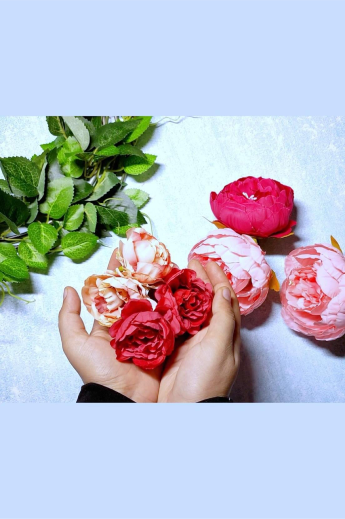 I choose artificial peonies and roses to decorate my wreath, you can choose whatever flowers you like is totally up to you