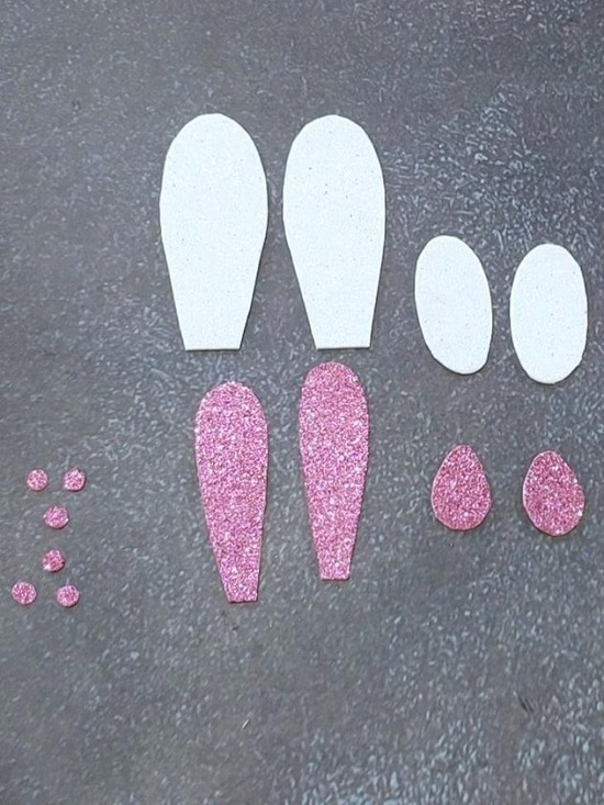 I cut the Easter bunny ears feet and nose from pink glittery paper 