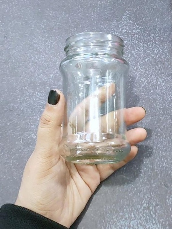 Take a normal empty glass jar from pickles or jam